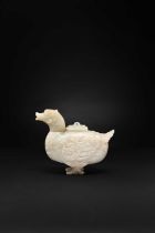A CHINESE CELADON JADE ARCHAISTIC 'DUCK' VESSEL AND COVER LATE QING DYNASTY Modelled in the shape of