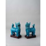 A PAIR OF CHINESE TURQUOISE-GLAZED FIGURES OF QILIN QING DYNASTY Standing four-square with their