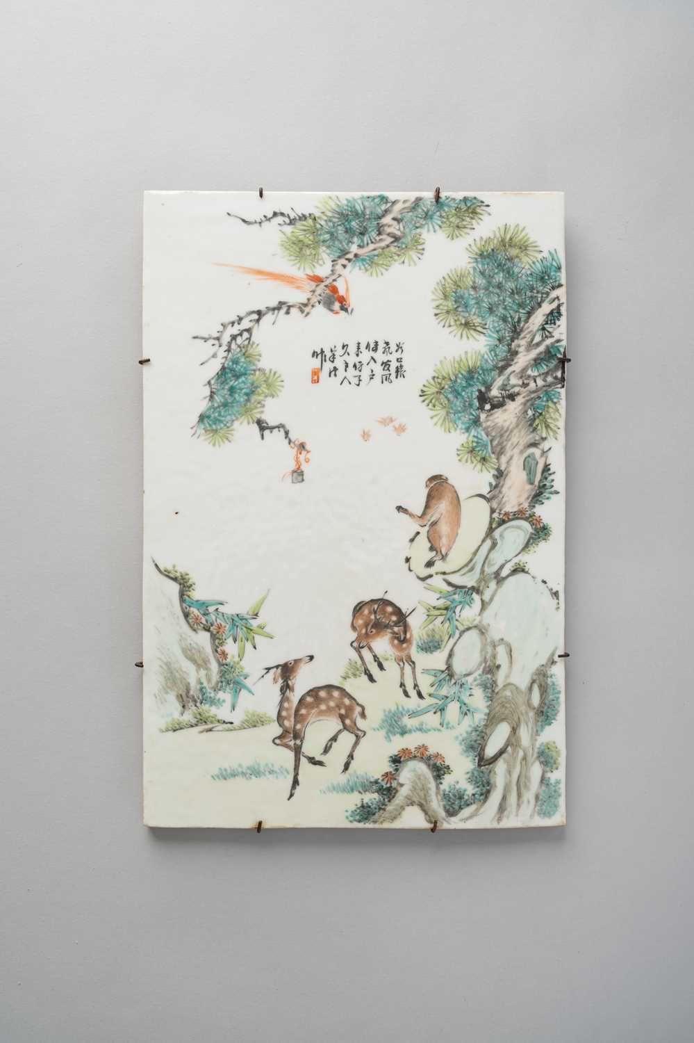 A CHINESE ENAMELLED PORCELAIN PANEL REPUBLIC PERIOD Depicting two deer, a monkey and a red