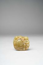 A CHINESE YELLOW JADE 'BOYS AND DRUM' GROUP QING DYNASTY OR LATER Carved in openwork with two boys