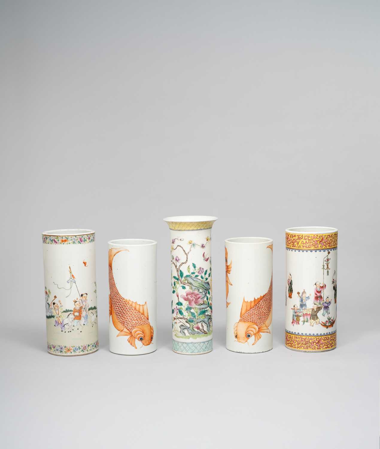 NO RESERVE A PAIR OF CHINESE CYLINDRICAL ‘CARP’ VASES AND THREE FAMILLE ROSE VASES LATE QING