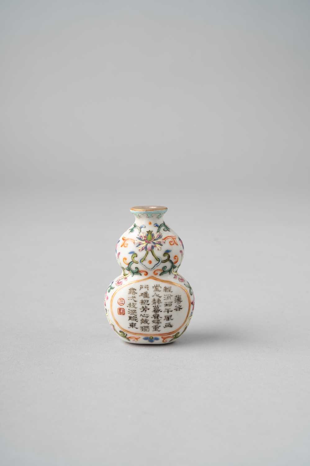 A CHINESE FAMILLE ROSE GOURD-SHAPED SNUFF BOTTLE QING DYNASTY OR LATER The body decorated with two