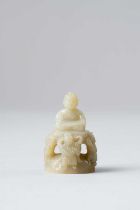 NO RESERVE A CHINESE SMALL CELADON JADE FINIAL OF SHAKYAMUNI BUDDHA MING DYNASTY OR LATER Seated
