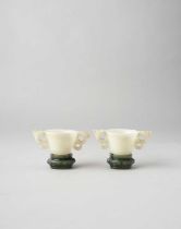 NO RESERVE A PAIR OF CHINESE WHITE JADE CUPS AND SPINACH-GREEN JADE STANDS QING DYNASTY The cups