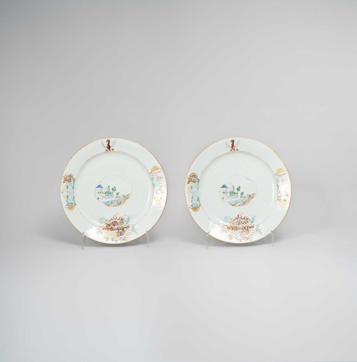 A LARGE PAIR OF CHINESE FAMILLE ROSE ARMORIAL DISHES QIANLONG C.1745 Each painted with cartouches of