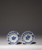 A PAIR OF CHINESE BLUE AND WHITE MINIATURE DISHES KANGXI 1662-1722 Decorated with a leafy floral