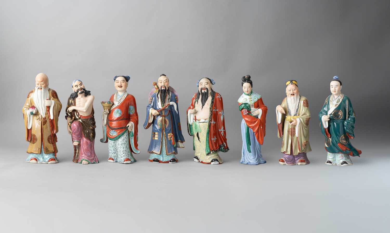 EIGHT CHINESE FAMILLE ROSE BISCUIT FIGURES OF DAOIST IMMORTALS REPUBLIC PERIOD Including Shoulao,