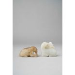 TWO CHINESE JADE CARVINGS OF ANIMALS QING DYNASTY OR LATER One a white jade carving of a deer with a