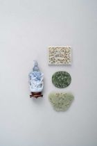 A GROUP OF THREE CHINESE JADE PLAQUES QING DYNASTY One pale celadon and rectangular, pierced with
