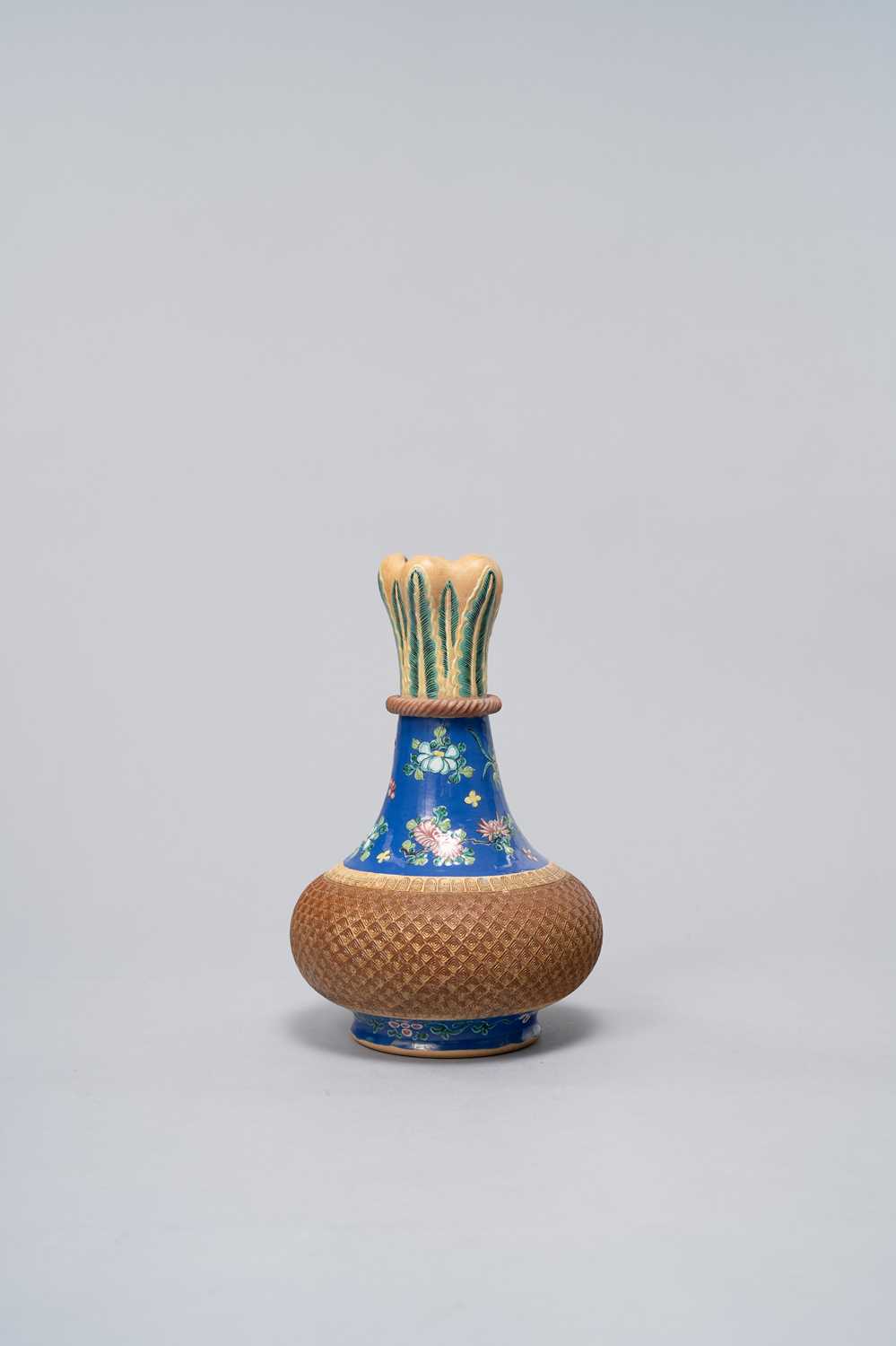 A CHINESE ENAMELLED YIXING BOTTLE VASE SIGNED SHEN XI, DAOGUANG 1821-50 The ovoid body below a