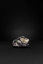 A CHINESE BLACK AND CELADON JADE 'SCHOLAR AND DEER' BOULDER QING DYNASTY One side carved with a