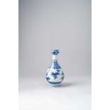 A CHINESE BLUE AND WHITE ‘FRUITS AND FLOWERS’ GARLIC-MOUTH VASE, SUANTOUPING PROBABLY LATE QING