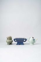 NO RESERVE A CHINESE CELADON-GLAZED CADOGAN TEAPOT QING DYNASTY Decorated with moulded fruiting