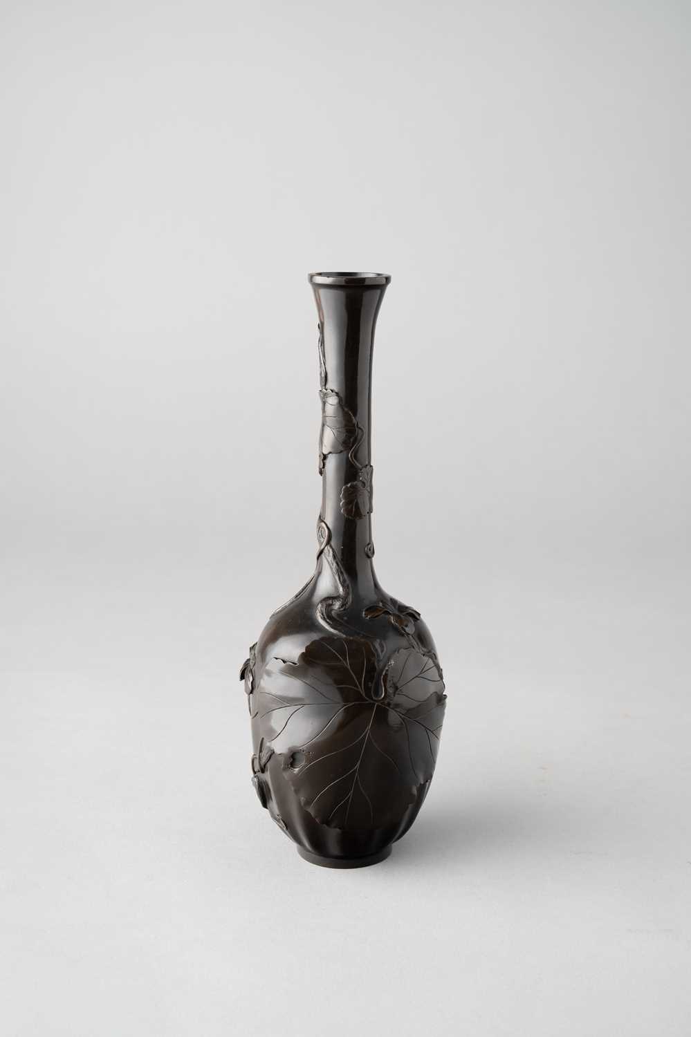 A JAPANESE BRONZE VASE BY MASAYUKI MEIJI ERA, 19TH/20TH CENTURY The oblong body with a tall,