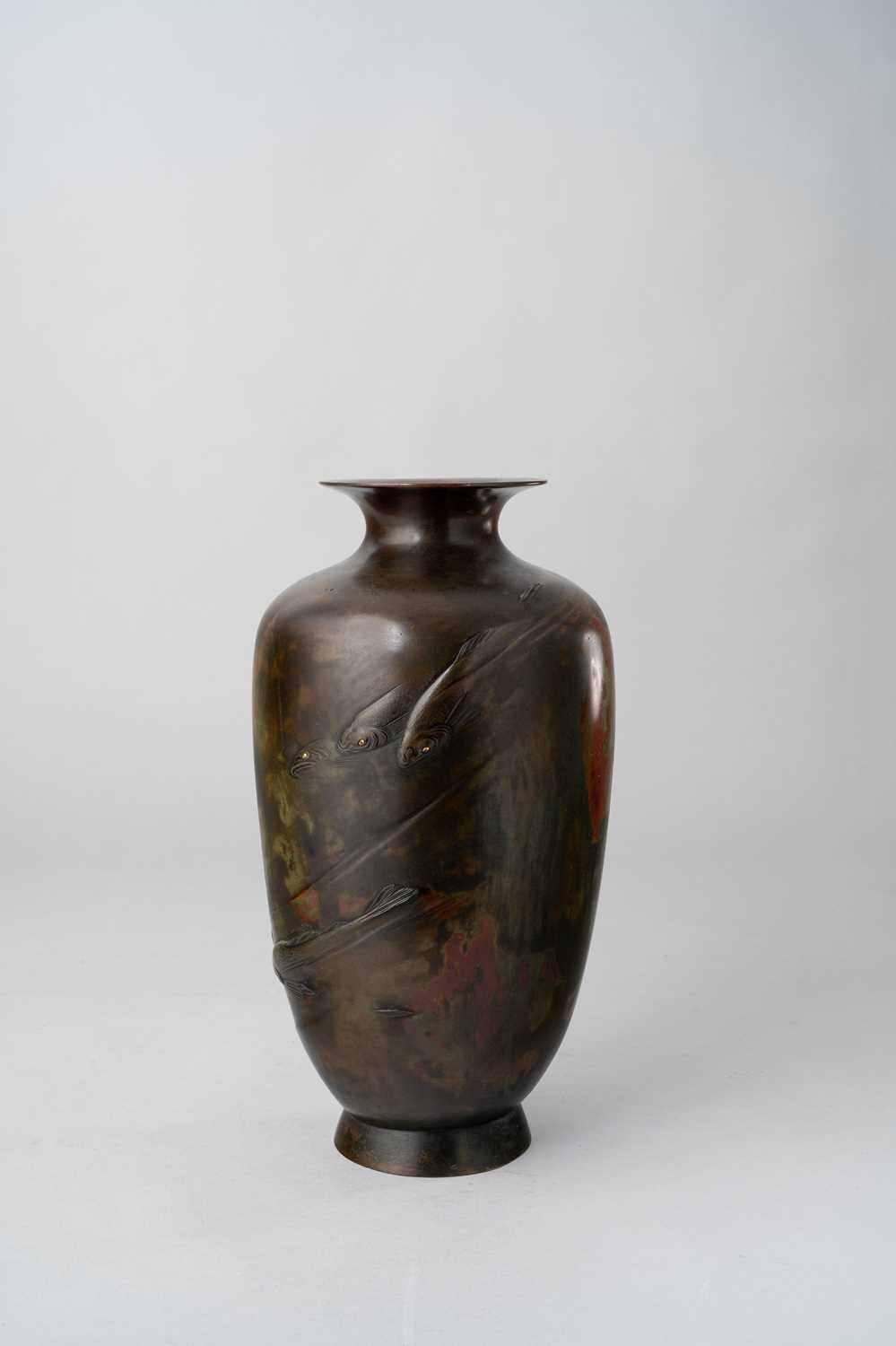 A TALL JAPANESE BRONZE VASE MEIJI ERA, 19TH/20TH CENTURY The cylindrical body raised on a short foot