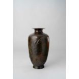 A TALL JAPANESE BRONZE VASE MEIJI ERA, 19TH/20TH CENTURY The cylindrical body raised on a short foot