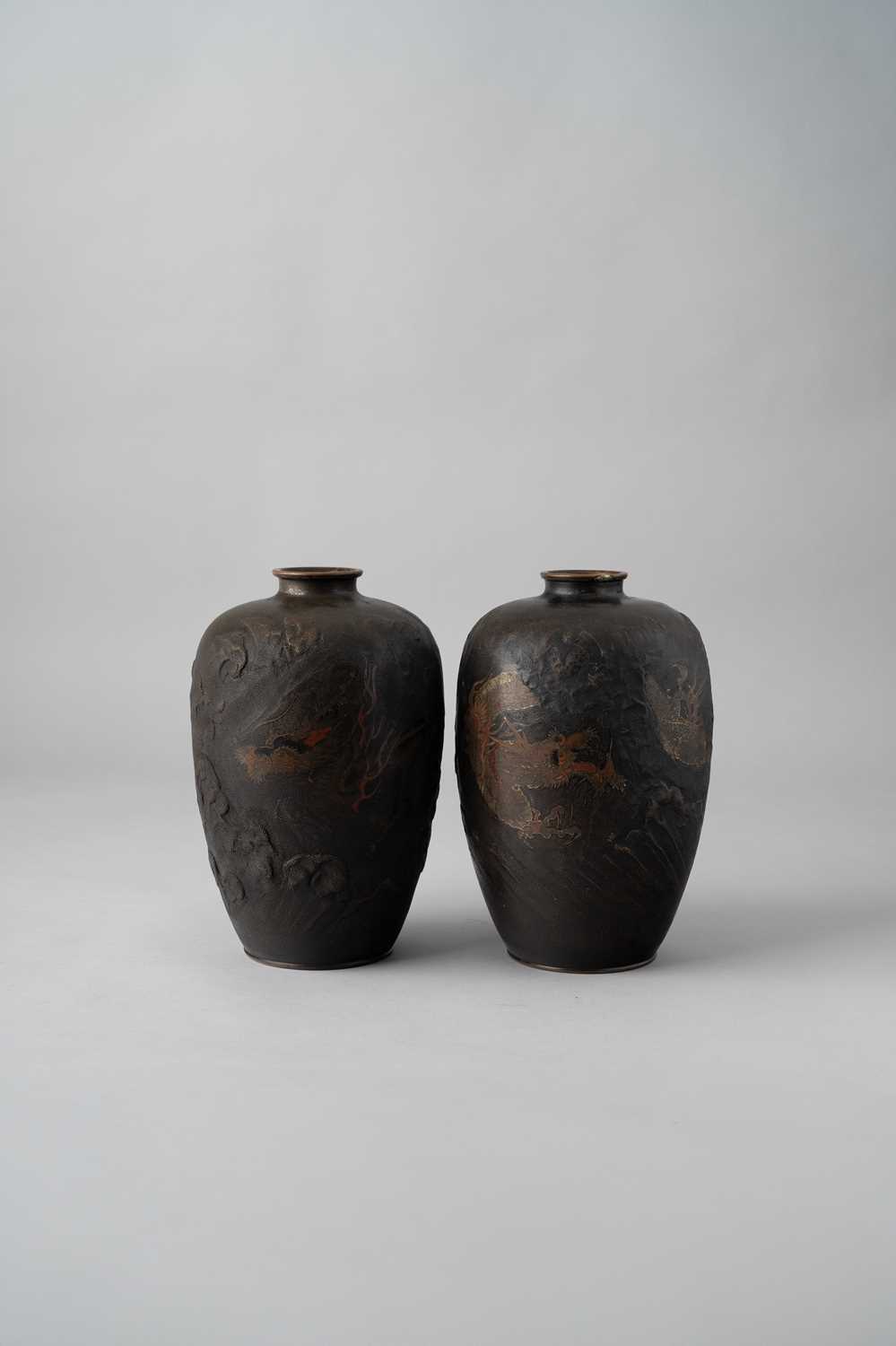 A PAIR OF JAPANESE BRONZE DRAGON VASES MEIJI ERA, 19TH/20TH CENTURY Each decorated with a writhing