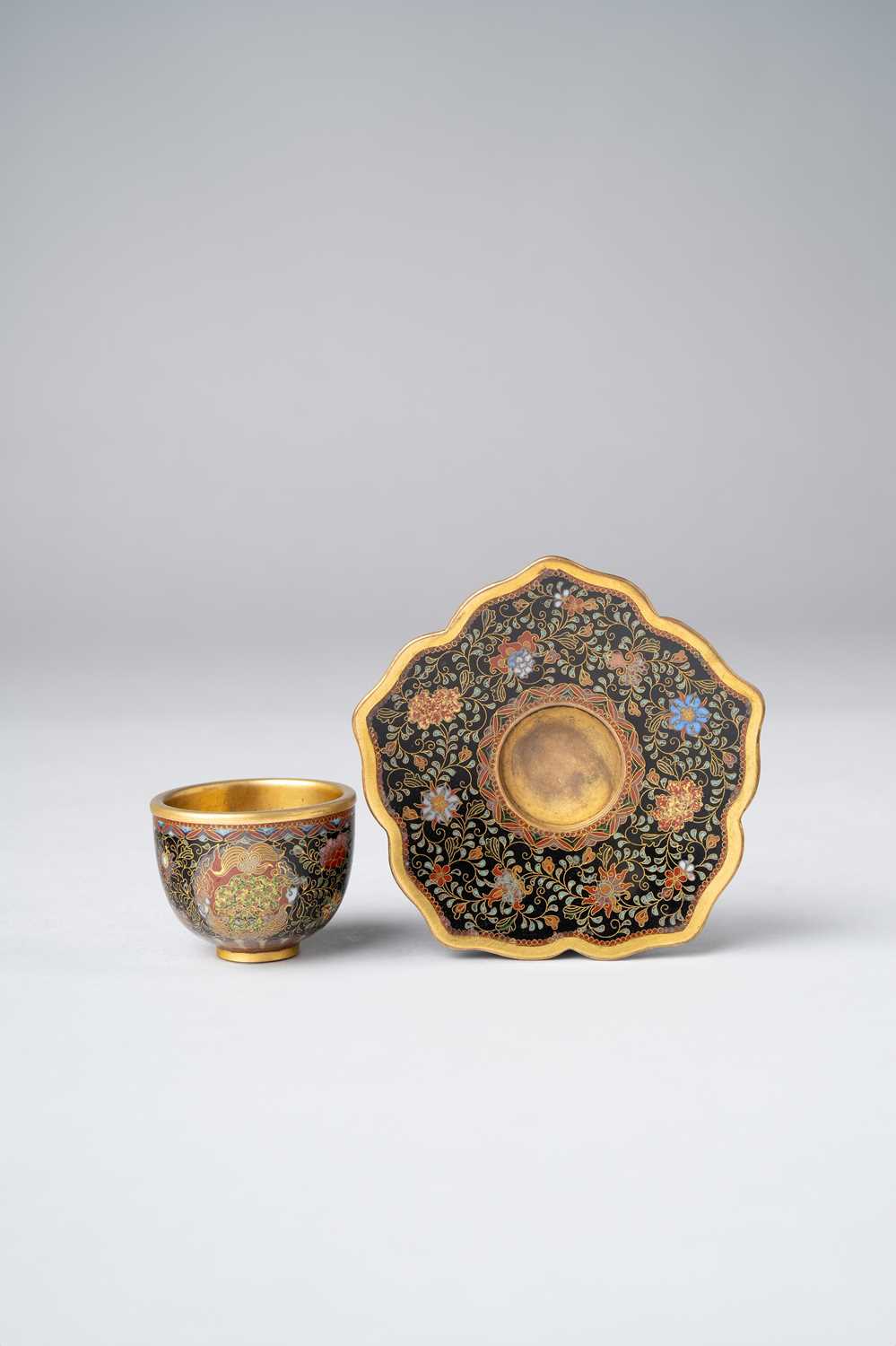 A JAPANESE MINIATURE CLOISONNE CUP AND SAUCER IN THE STYLE OF NAMIKAWA YASUYUKI MEIJI PERIOD, 19TH/