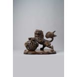 A JAPANESE BRONZE OKIMONO OF A SHISHI MEIJI OR LATER, 20TH CENTURY The lion dog baring its teeth,