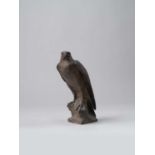 A JAPANESE BRONZE OKIMONO OF A FALCON SHOWA OR LATER, 20TH CENTURY The bird of prey is depicted
