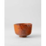 A JAPANESE OHI-YAKI RAKU CHAWAN (TEA BOWL) EDO PERIOD, 18TH-19TH CENTURY The U-shaped bowl raised on