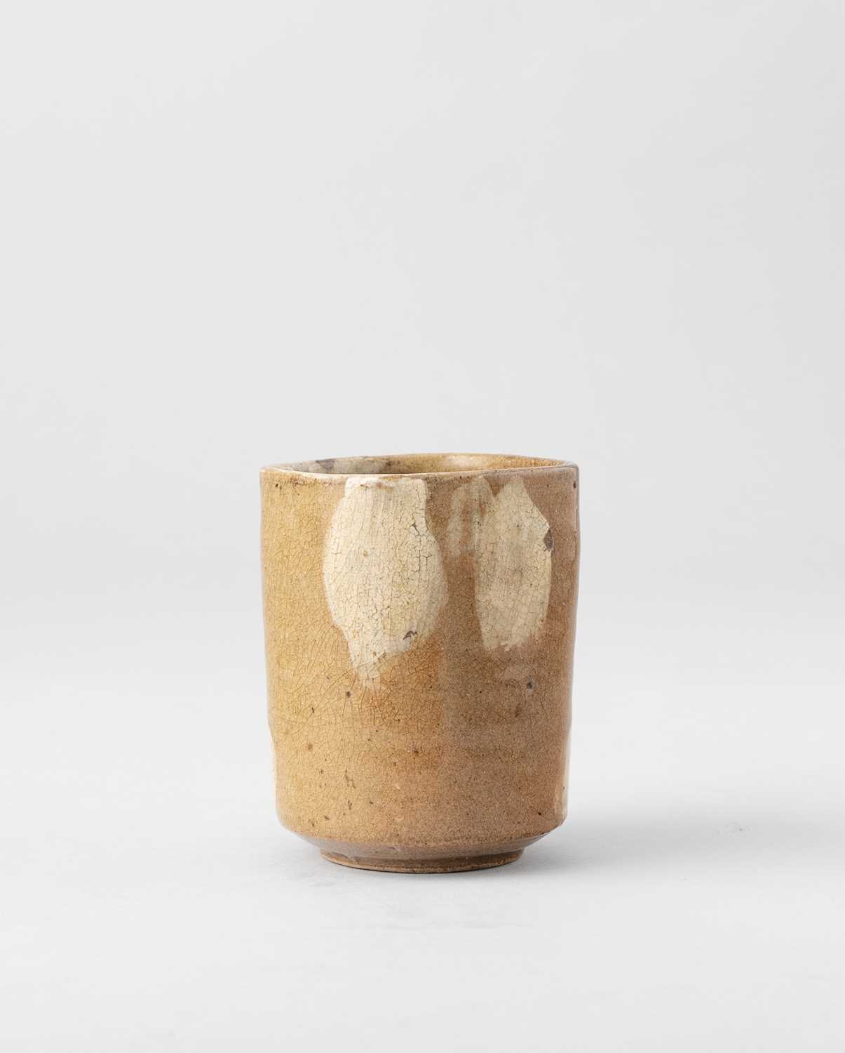 A JAPANESE KI-SETO CHAWAN (TEA BOWL) PROBABLY EDO, 18TH/19TH CENTURY Of tall rhomboid shape and