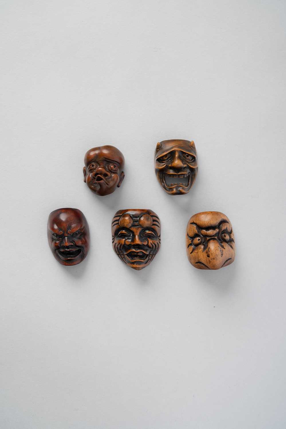 NO RESERVE FIVE JAPANESE WOOD MASK NETSUKE EDO/MEIJI, 19TH CENTURY The first depicting Okina, the