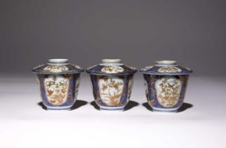 THREE JAPANESE CUPS AND COVERS EDO PERIOD, c.1690-1700 All decorated with panels enclosing