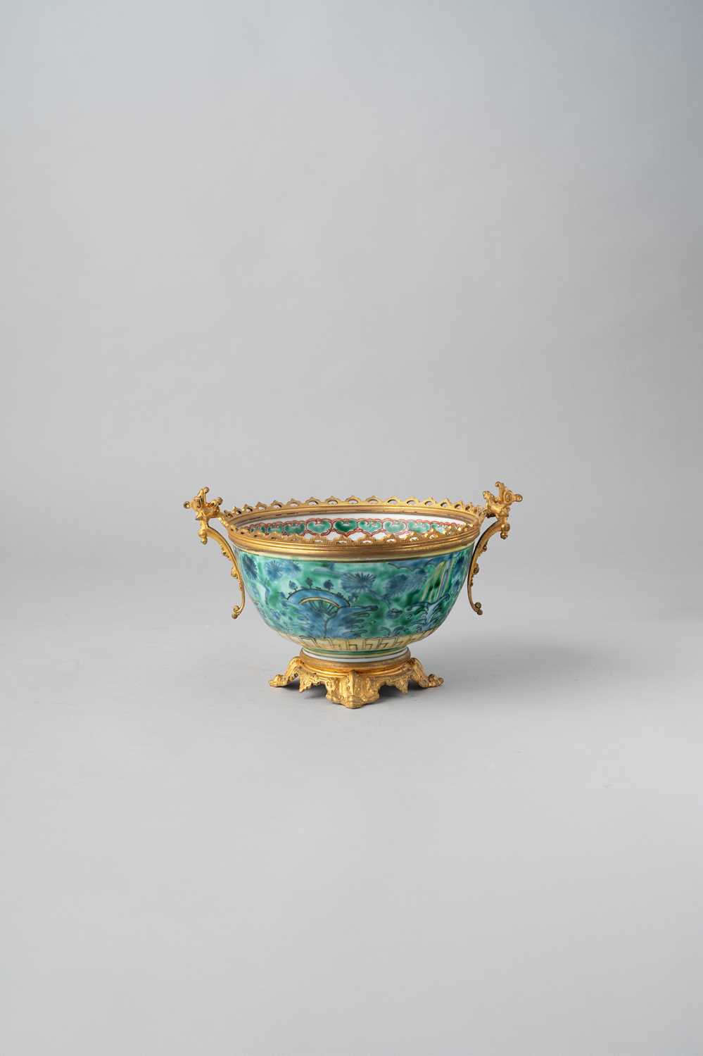 A JAPANESE ARITA BOWL WITH ORMOLU MOUNTS PROBABLY MEIJI, 19TH CENTURY Decorated in underglaze blue