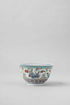 A JAPANESE KAKIEMON-STYLE BOWL EDO PERIOD, 17TH CENTURY Raised on a short foot, painted with various