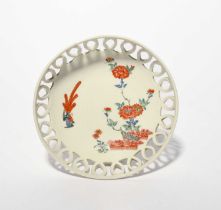 A JAPANESE KAKIEMON-STYLE RETICULATED BOWL EDO PERIOD, 17TH/18TH CENTURY Of circular form raised