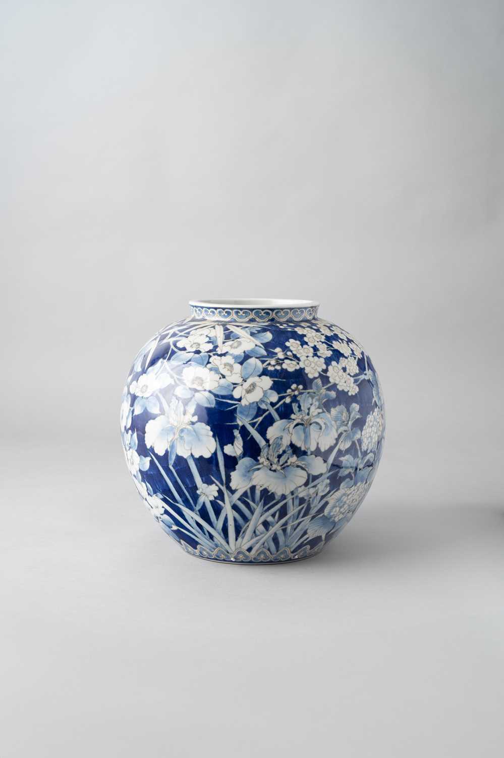 A LARGE JAPANESE BLUE AND WHITE VASE TAISHO OR LATER, 20TH CENTURY With a tall bulbous body and a