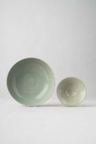 TWO KOREAN CELADON BOWLS POSSIBLY GORYEO, 13TH CENTURY OR LATER The largest with a wide mouth and