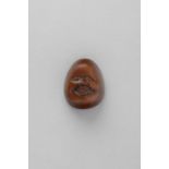 NO RESERVE A JAPANESE WOOD MASK NETSUKE OF OTAFUKU EDO/MEIJI, 19TH CENTURY Depicted with a chubby