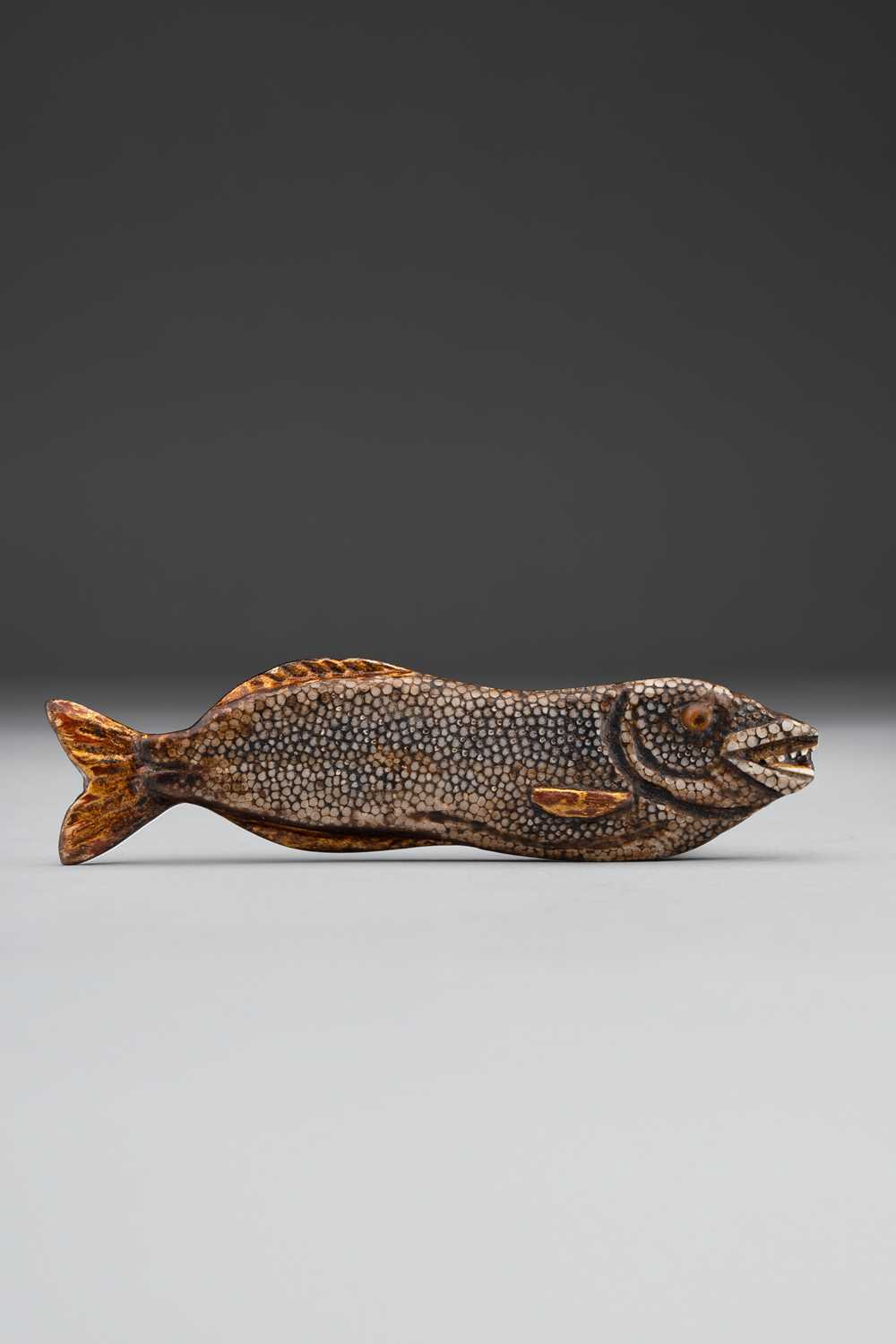 AN UNUSUAL JAPANESE NETSUKE OF A HIMONO (DRIED FISH) EDO PERIOD, 18TH/19TH CENTURY The flattened