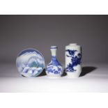 THREE JAPANESE CERAMIC PIECES MEIJI AND LATER, 19TH AND 20TH CENTURY The first a cylindrical vase
