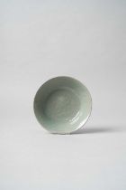 A KOREAN MOULDED CELADON BOWL GORYEO DYNASTY, 12TH/13TH CENTURY The shallow body rising from a short