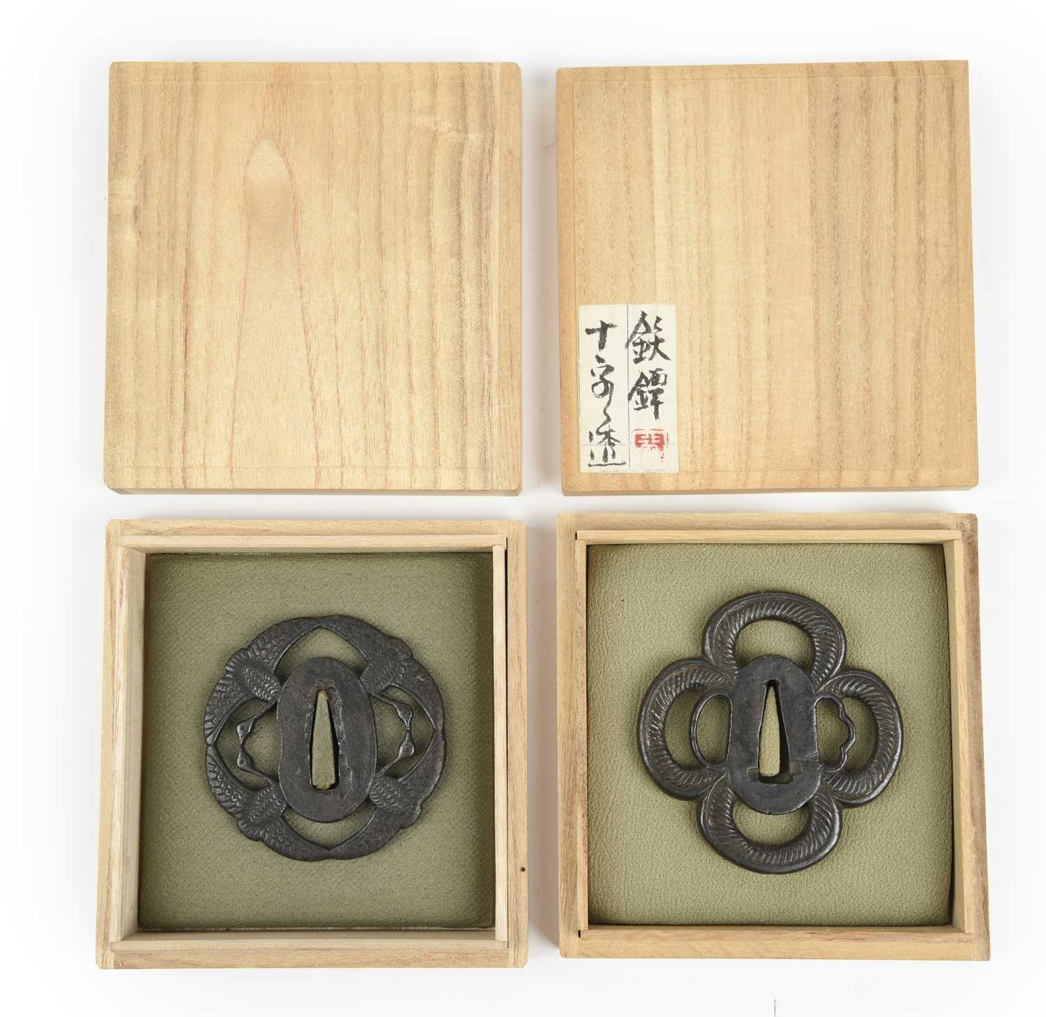 A collection of Japanese sword fittings, comprising: Three Japanese iron sword guards (tsuba), - Image 6 of 15