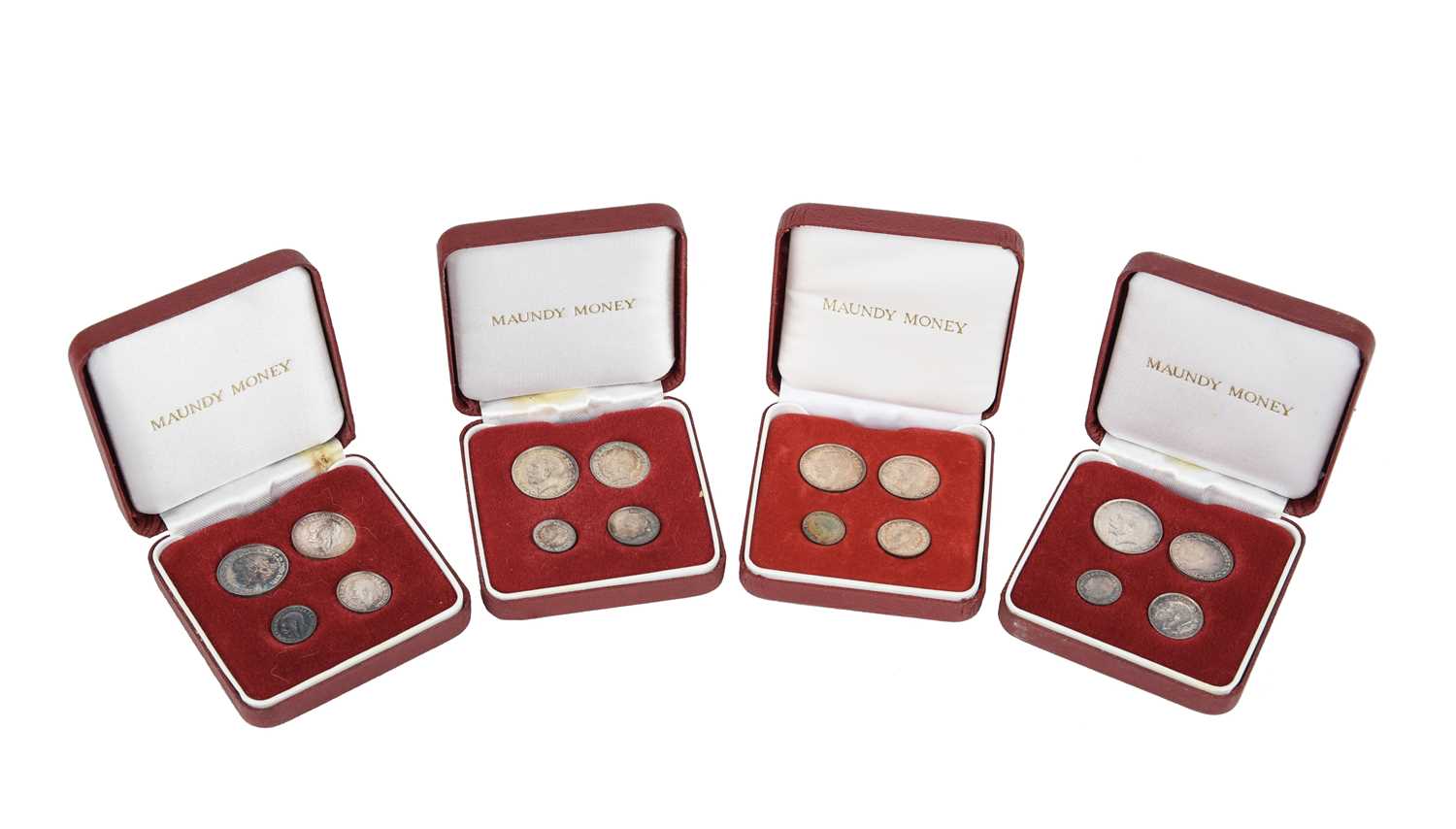 George V, four silver maundy sets: 1914, 1915, 1916 and 1918 (S 4016), in later fitted cases, Some