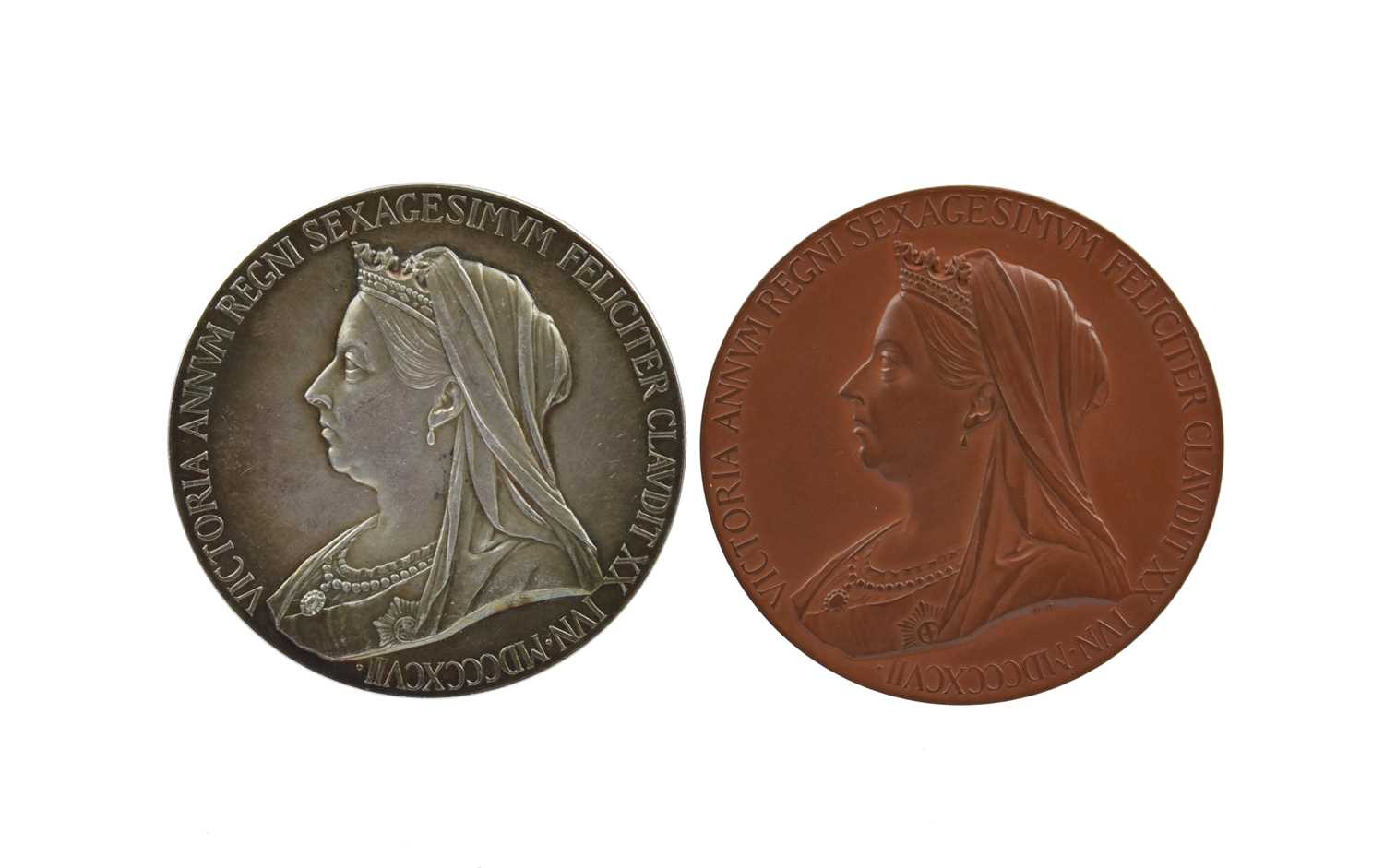 Victoria, Diamond Jubilee 1897, a silver medal by G. W. De Saulles, veiled bust left, rev. young