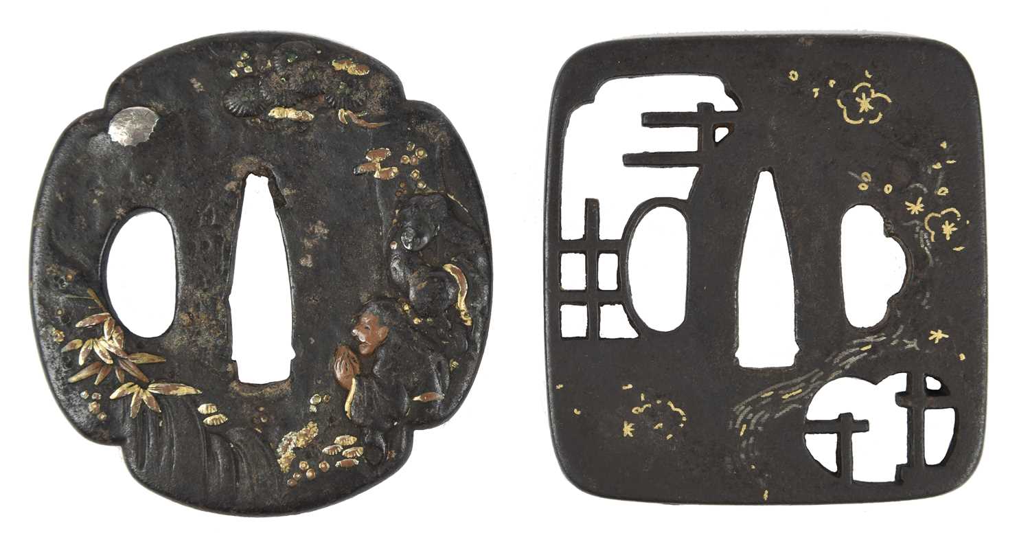 A collection of Japanese sword fittings, comprising: Three Japanese iron sword guards (tsuba),