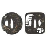 A collection of Japanese sword fittings, comprising: Three Japanese iron sword guards (tsuba),
