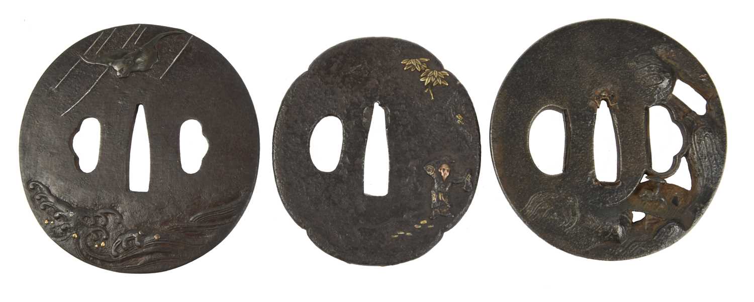 A collection of Japanese sword fittings, comprising: Three Japanese iron sword guards (tsuba), - Image 11 of 15