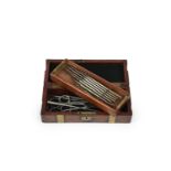 A brass bound oak surgical instrument case by S Maw Son & Thompson, with associated contents