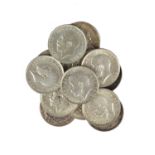 A quantity of British small denomination silver and cupro-nickel coins, including: shillings: