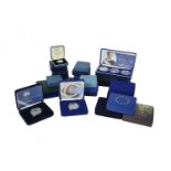 Elizabeth II: a quantity of cased silver proof coins, pairs and singles, including: 80th Birthday
