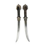 Two Moroccan daggers (jambiya), each with slightly curved and bi-fullered blade 9 in., silver