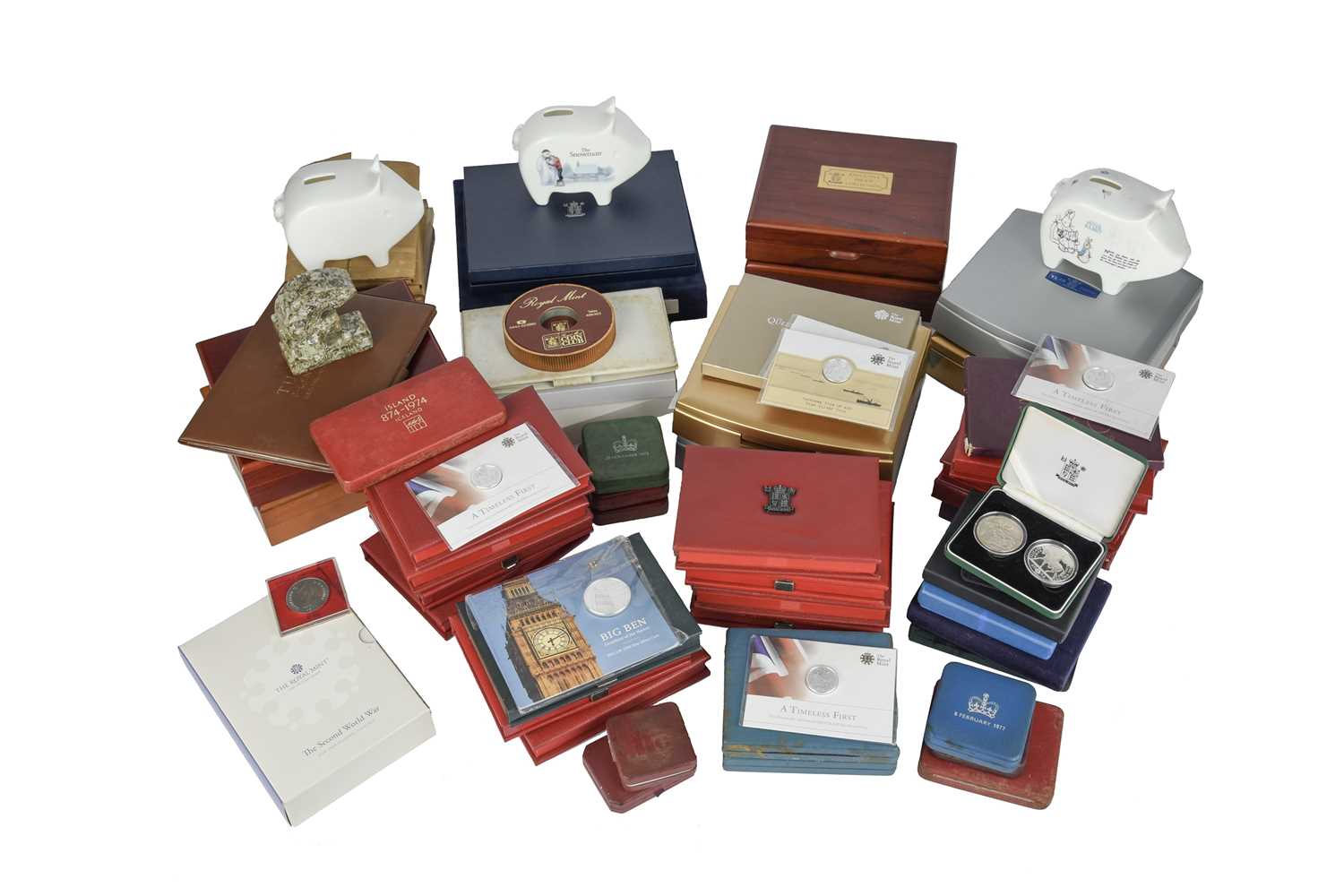 A collection of miscellaneous proof coins sets and associated items, including Royal Mint base metal