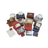 A collection of miscellaneous proof coins sets and associated items, including Royal Mint base metal