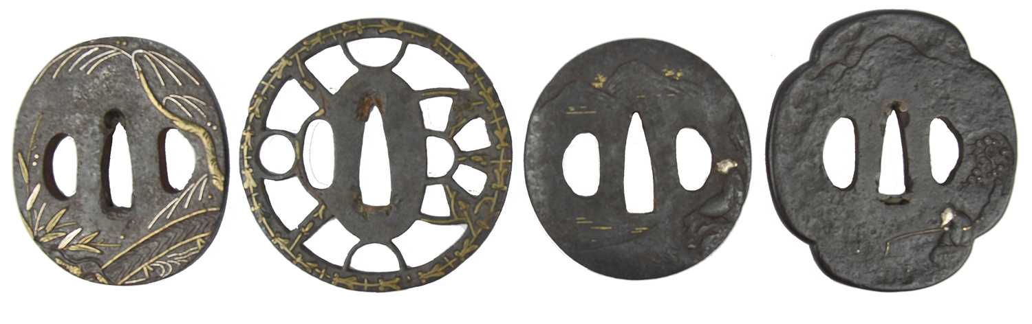 A collection of Japanese sword fittings, comprising: Three Japanese iron sword guards (tsuba), - Image 7 of 15